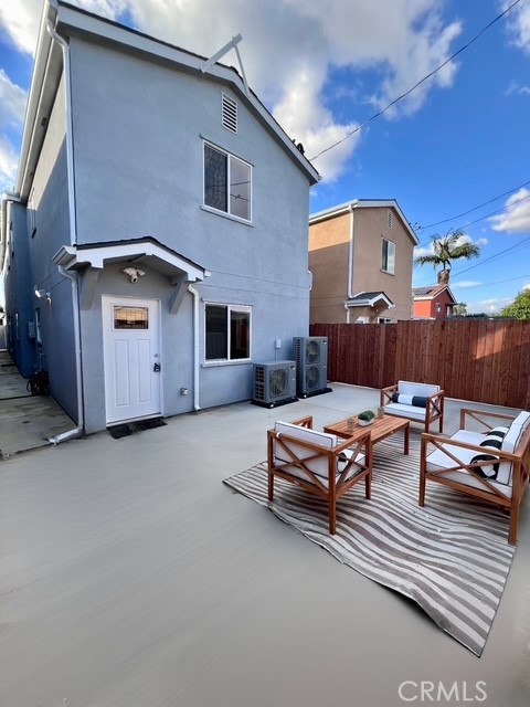 22022 Pioneer Boulevard Hawaiian Gardens, CA 90716 - Photo 33 of 50 a backyard of a house with barbeque oven table and chairs