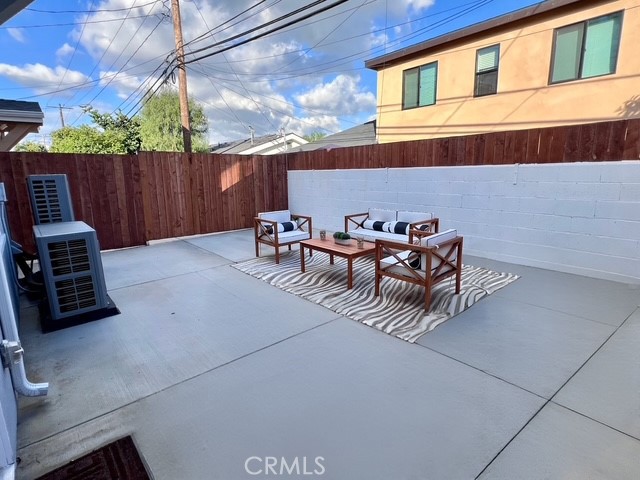 22022 Pioneer Boulevard Hawaiian Gardens, CA 90716 - Photo 34 of 50 a backyard of a house with table and chairs