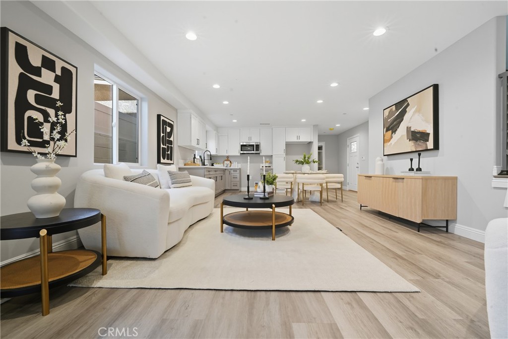22022 Pioneer Boulevard Hawaiian Gardens, CA 90716 - Photo 4 of 50 a living room with furniture and a couch