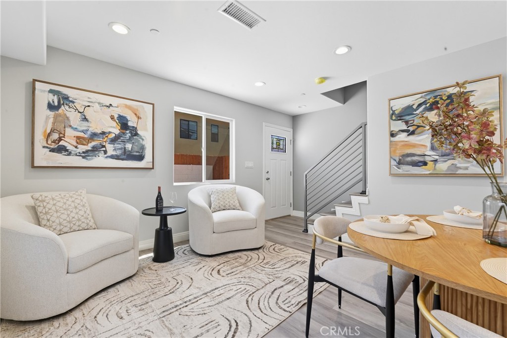 22022 Pioneer Boulevard Hawaiian Gardens, CA 90716 - Photo 41 of 50 a living room with furniture and a large window