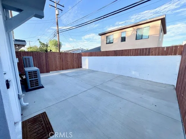 a view of a house with a fence