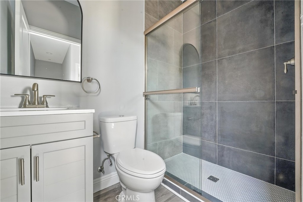 22022 Pioneer Boulevard Hawaiian Gardens, CA 90716 - Photo 46 of 50 a bathroom with a sink toilet and shower