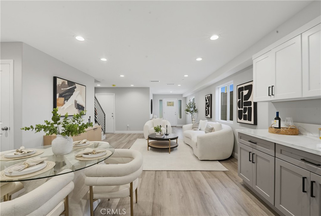 22022 Pioneer Boulevard Hawaiian Gardens, CA 90716 - Photo 5 of 50 a living room with furniture and view of kitchen