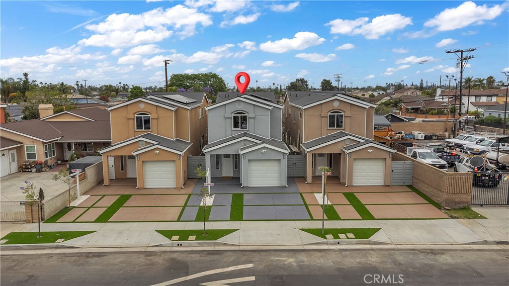22022 Pioneer Boulevard Hawaiian Gardens, CA 90716 - Photo 7 of 50 a front view of a house with a garden