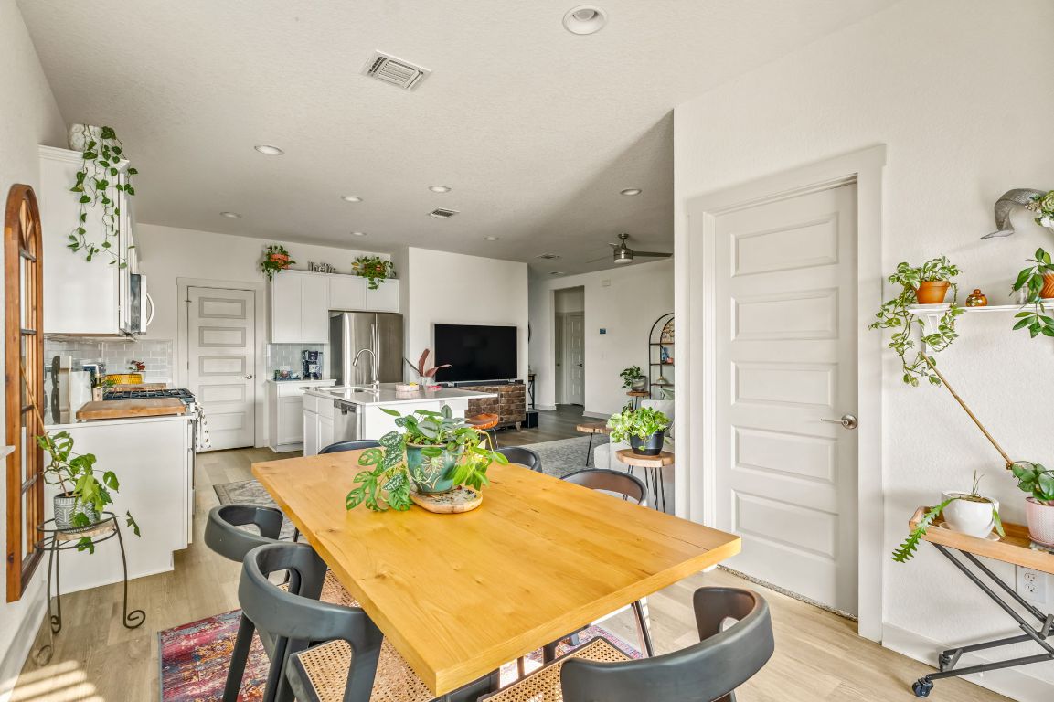 10002 Baden Lane Austin, TX 78754 - Photo 11 of 28 Dining area with light wood finished floors, recessed lighting, and a ceiling fan