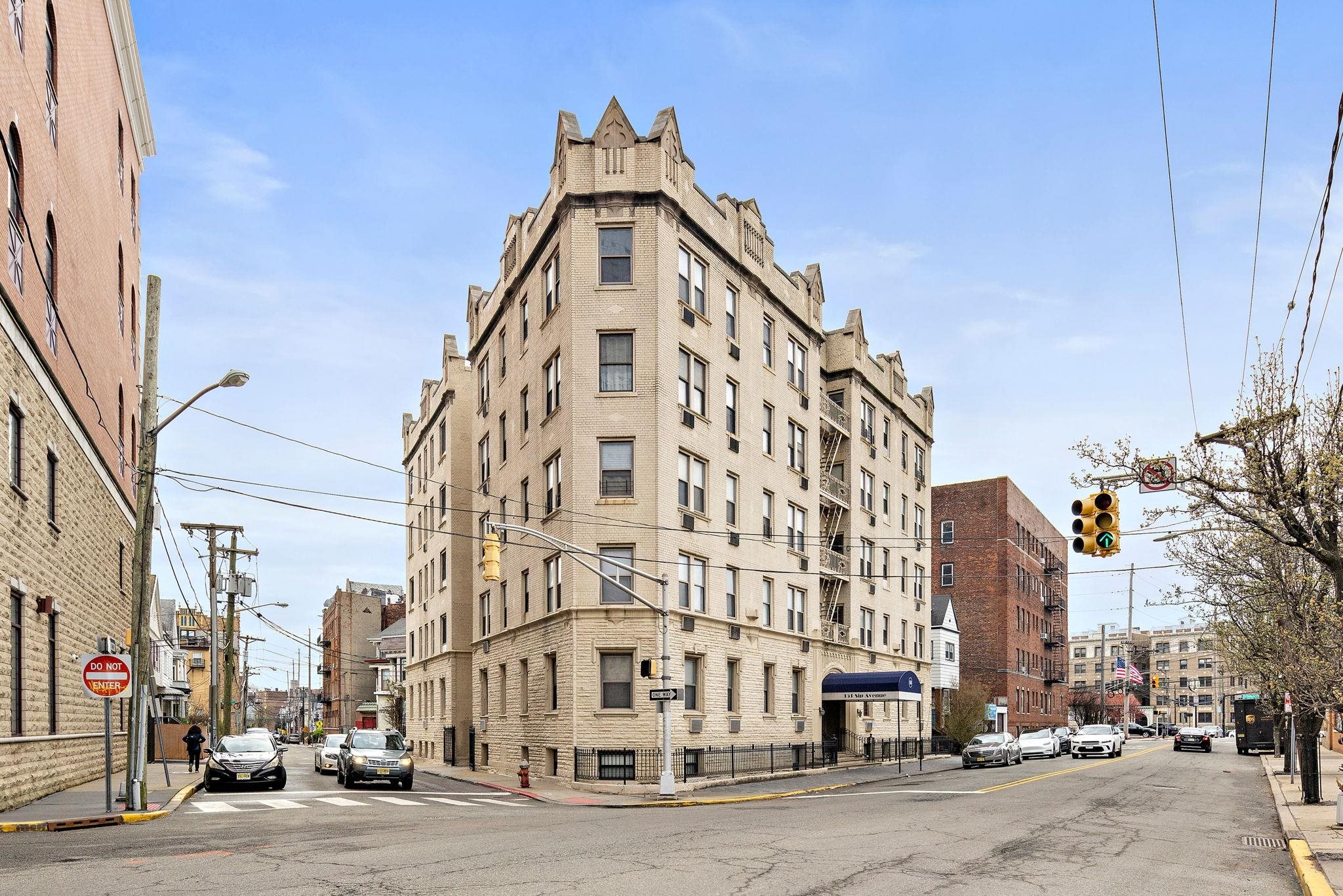 151 Sip Avenue, Unit 38 Jersey City, NJ 07306 - Photo 11 of 12 a view of a building with a street