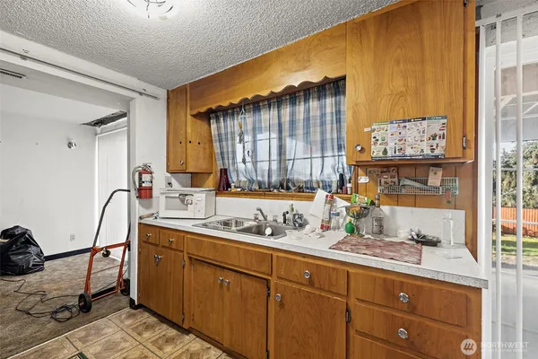 a view of cabinets and window