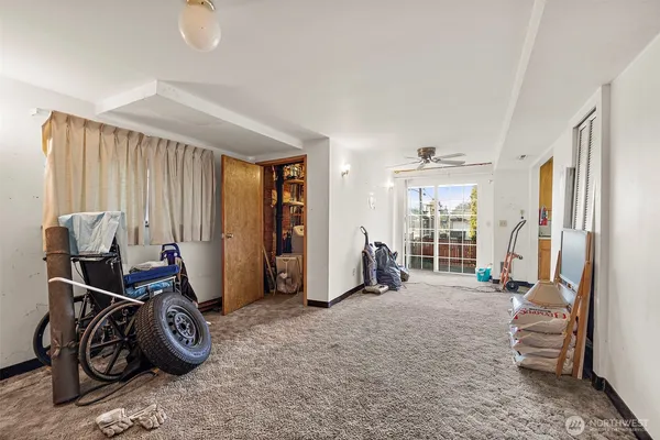 a view of livingroom with furniture and windows