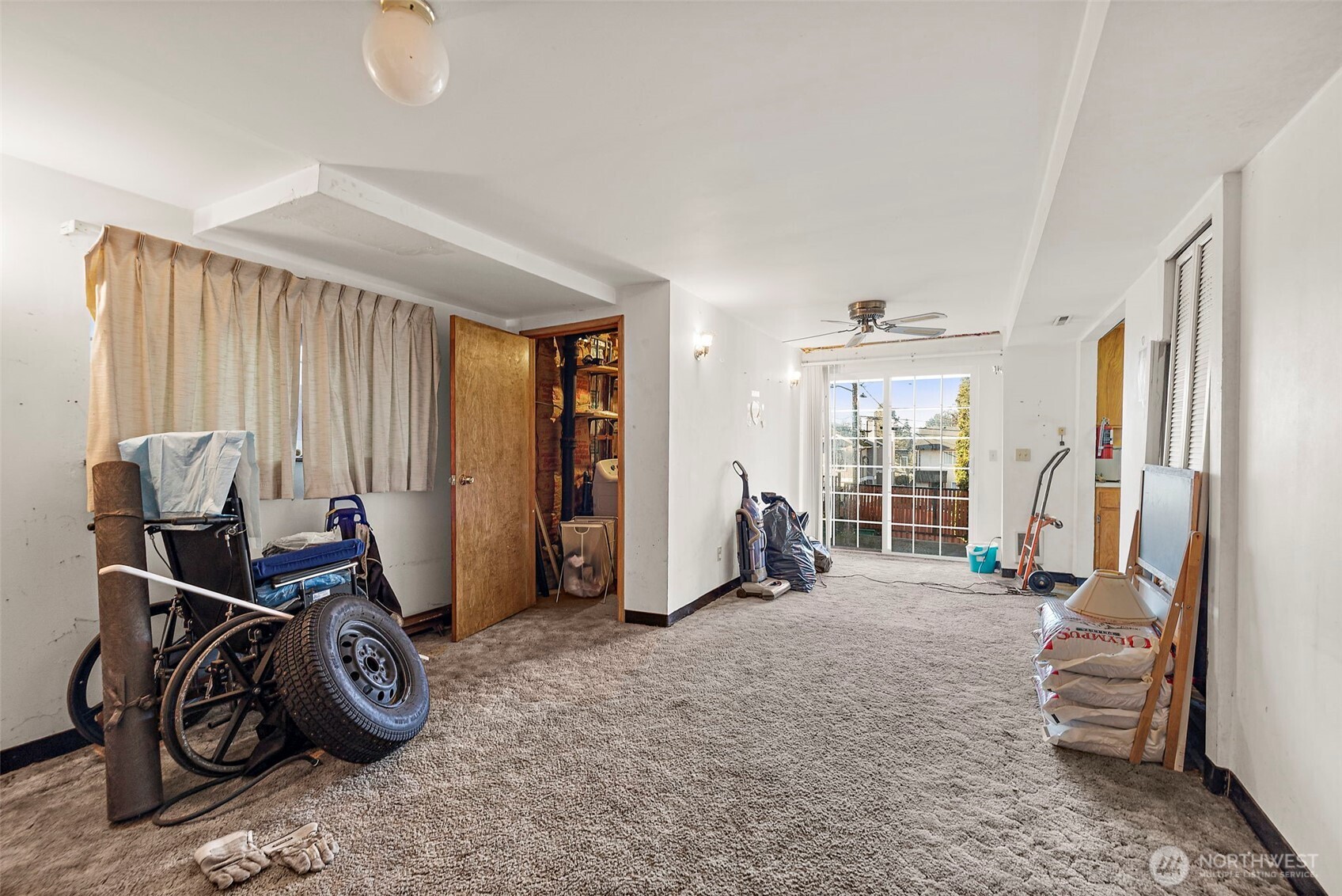 8829 20th Avenue Southwest Seattle, WA 98106 - Photo 31 of 40 a view of livingroom with furniture and windows