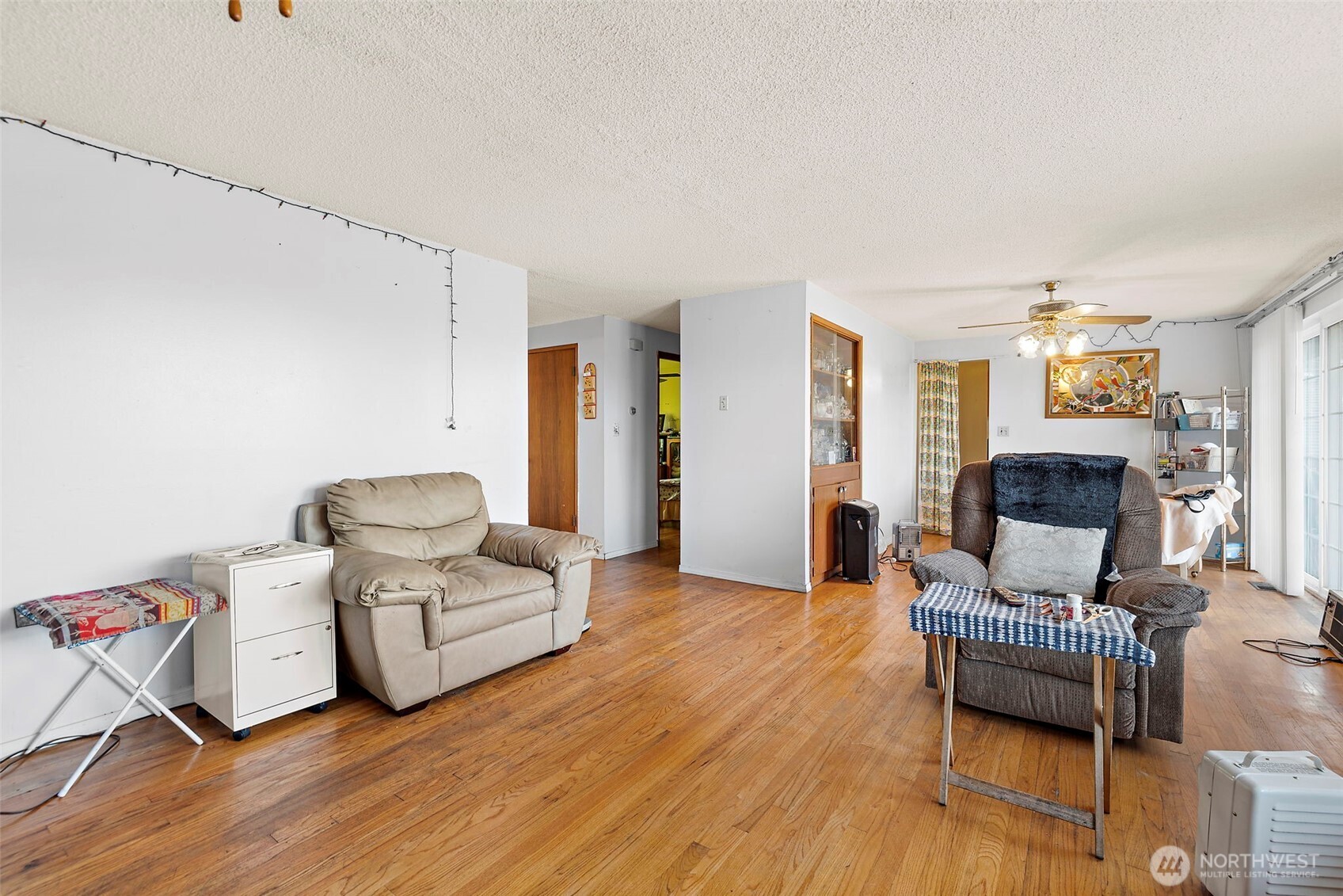 8829 20th Avenue Southwest Seattle, WA 98106 - Photo 4 of 40 a living room with furniture and wooden floor
