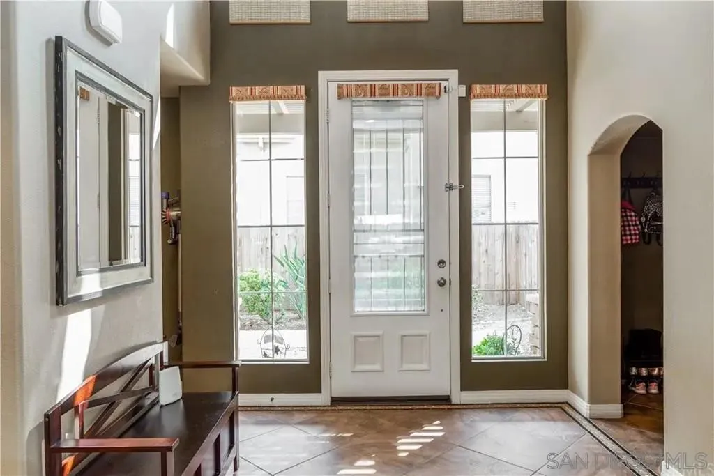 531 Poets Square Fallbrook, CA 92028 - Photo 4 of 19 a view of a room that has a bed and a window