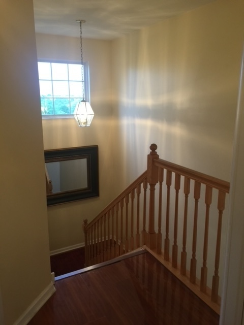 3493 Ravinia Circle, Unit 3493 Aurora, IL 60504 - Photo 2 of 18 a view of hallway with window
