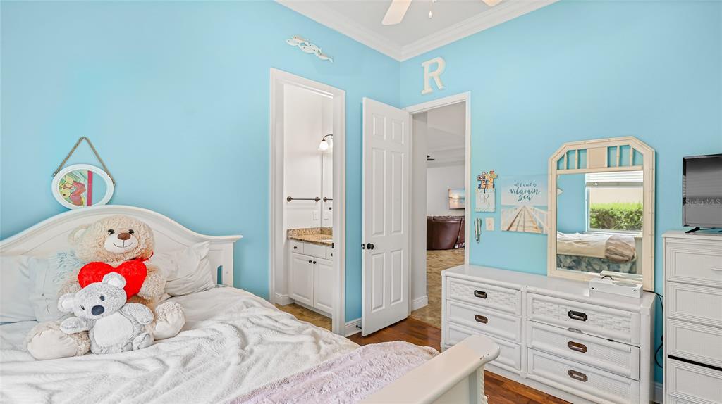 5621 Rock Dove Drive Sarasota, FL 34241 - Photo 33 of 49 a bedroom with a bed and a dresser