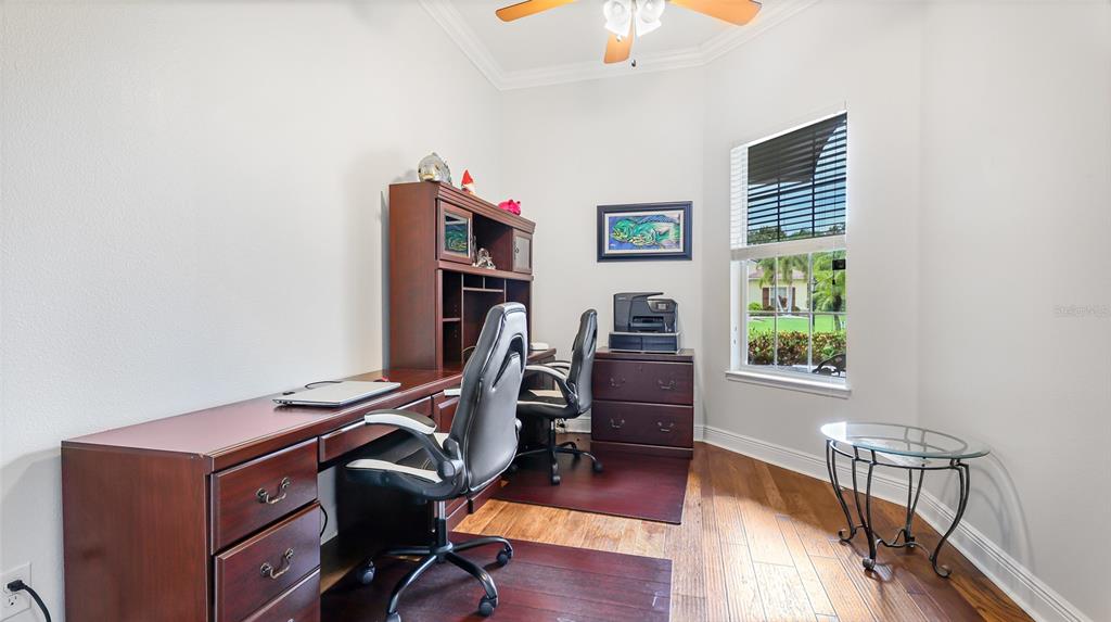 5621 Rock Dove Drive Sarasota, FL 34241 - Photo 34 of 49 a view of a workspace with furniture and a window