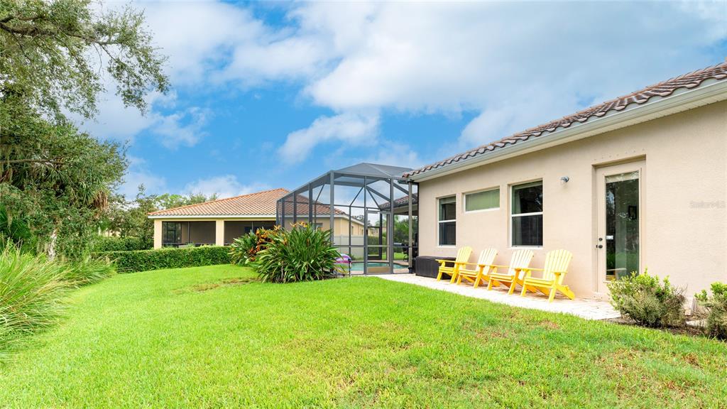 5621 Rock Dove Drive Sarasota, FL 34241 - Photo 41 of 49 a front view of house with yard and green space