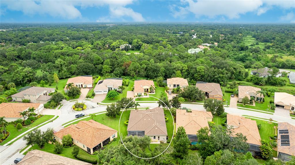 5621 Rock Dove Drive Sarasota, FL 34241 - Photo 48 of 49 an aerial view of residential houses with outdoor space and street view