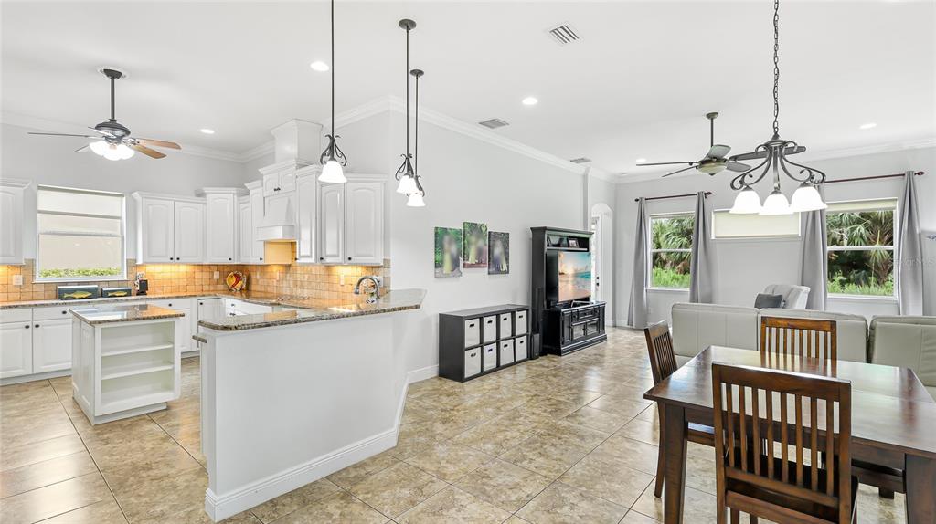 5621 Rock Dove Drive Sarasota, FL 34241 - Photo 6 of 49 a large kitchen with kitchen island a large island in it