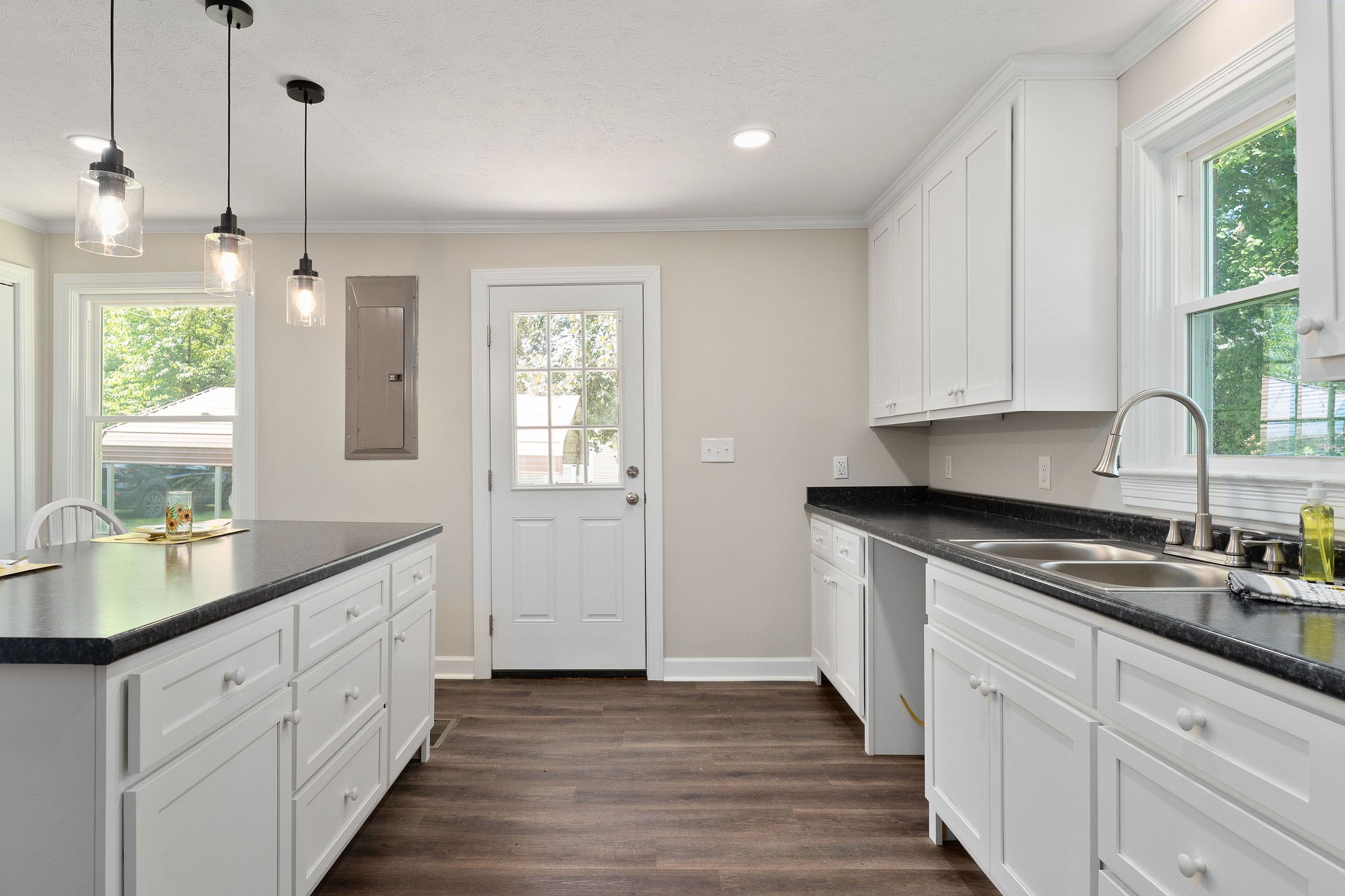 218 Roosevelt Road McMinnville, TN 37110 - Photo 14 of 31 a kitchen with granite countertop white cabinets white appliances and a window