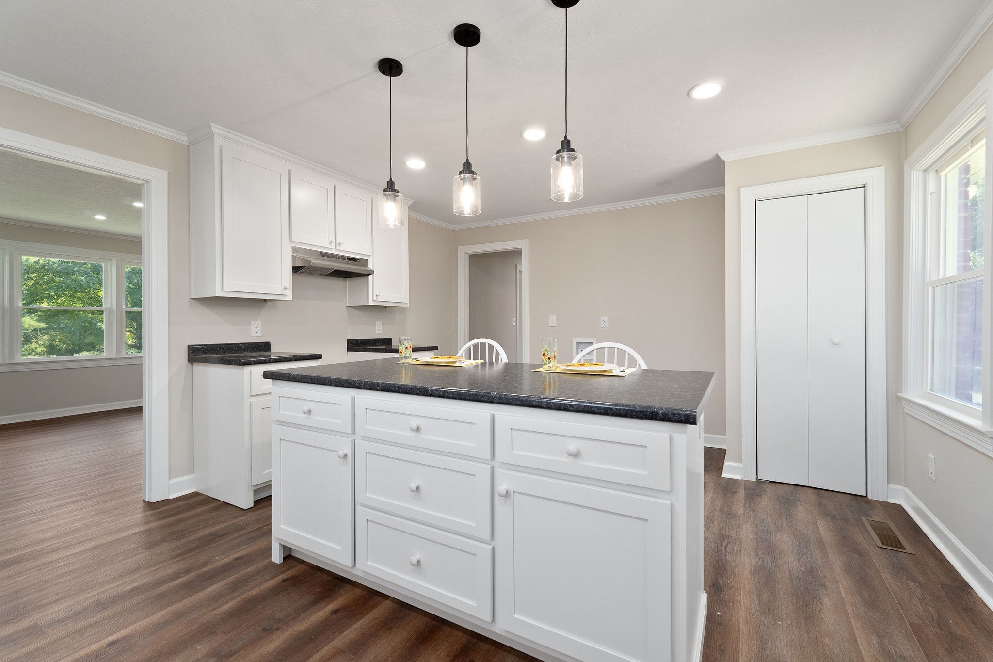 218 Roosevelt Road McMinnville, TN 37110 - Photo 18 of 31 a kitchen with white cabinets and sink