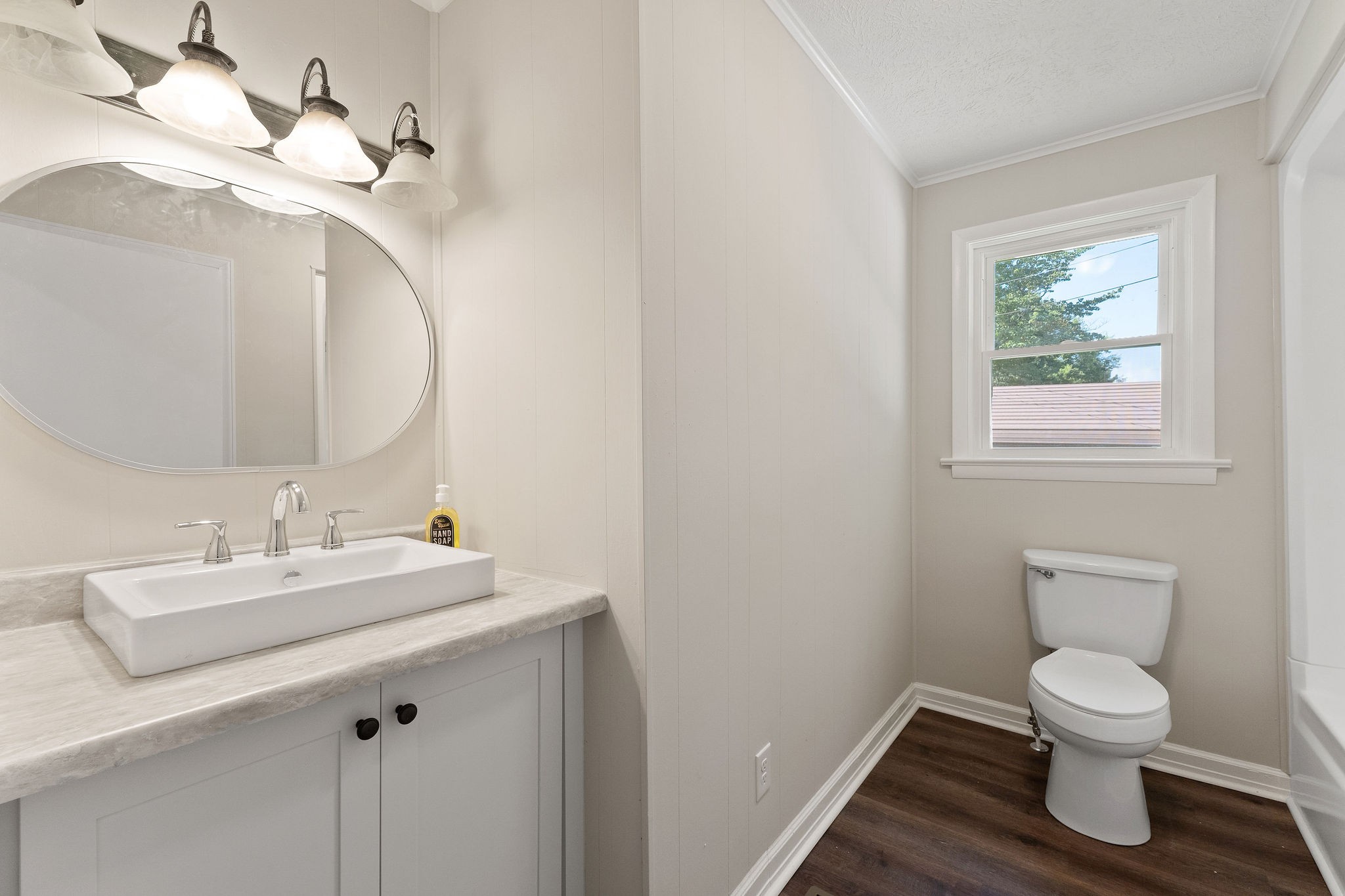 218 Roosevelt Road McMinnville, TN 37110 - Photo 22 of 31 a bathroom with a toilet sink and mirror
