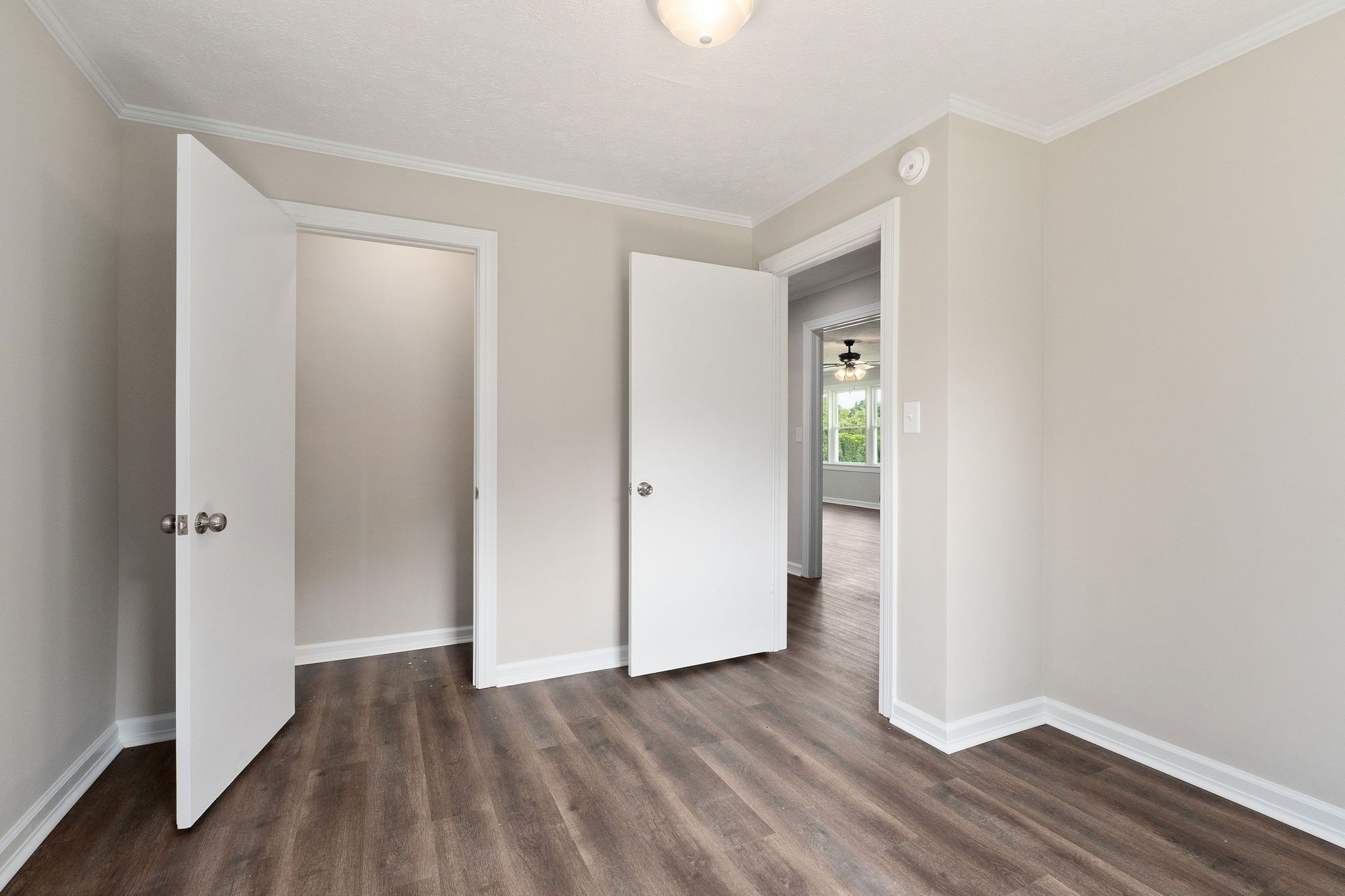 218 Roosevelt Road McMinnville, TN 37110 - Photo 28 of 31 a view of an empty room with wooden floor
