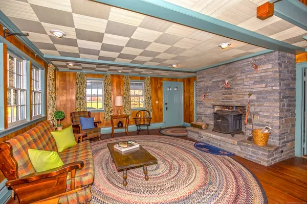 a room with furniture and a fireplace