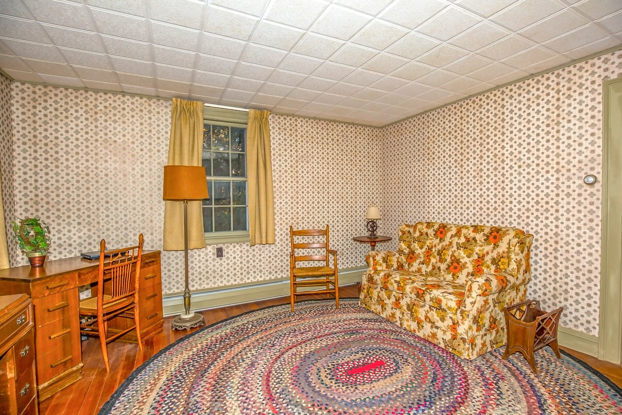 58 Maple Street Ellington, CT 06029 - Photo 26 of 55 a bedroom with a bed and a chair