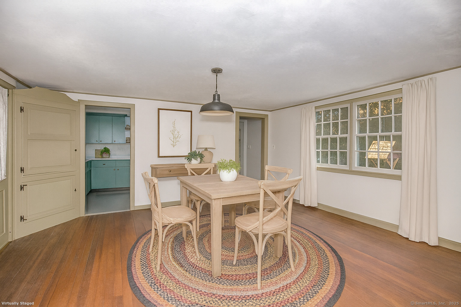 58 Maple Street Ellington, CT 06029 - Photo 28 of 55 a view of a dining room with furniture window and wooden floor