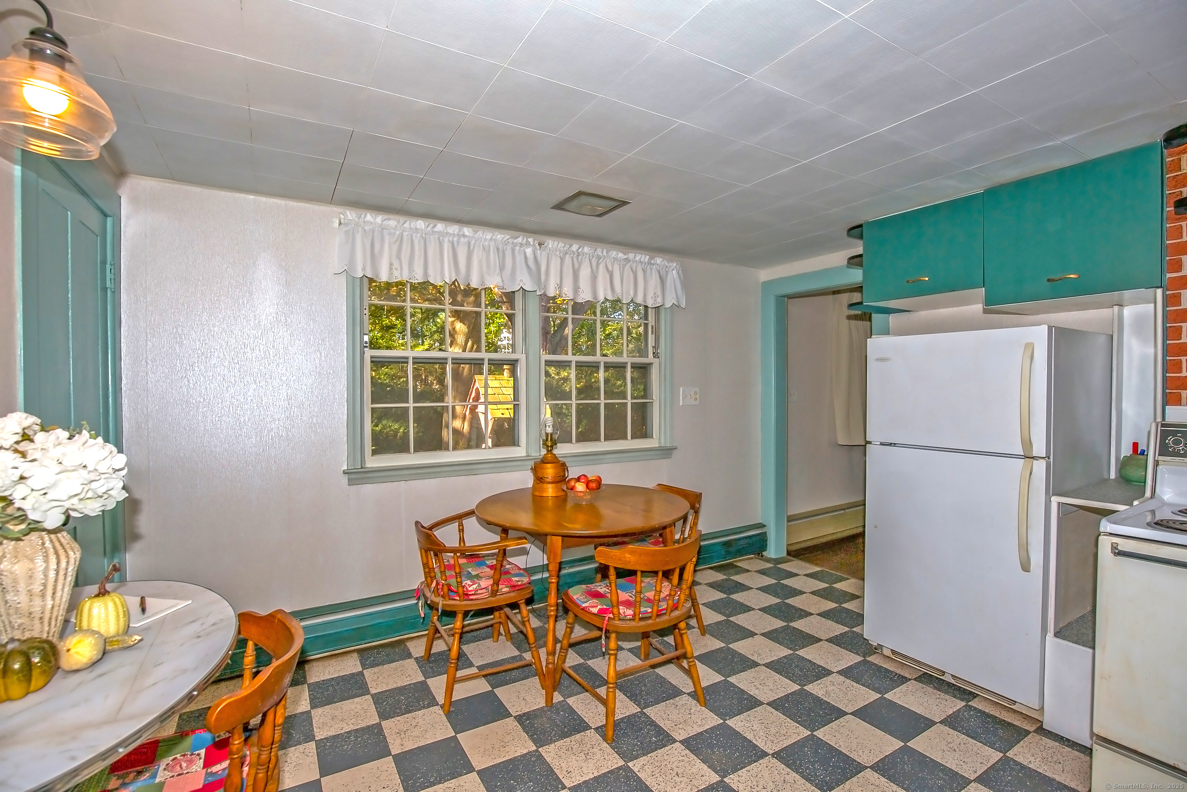 58 Maple Street Ellington, CT 06029 - Photo 29 of 55 a dining room with furniture and window