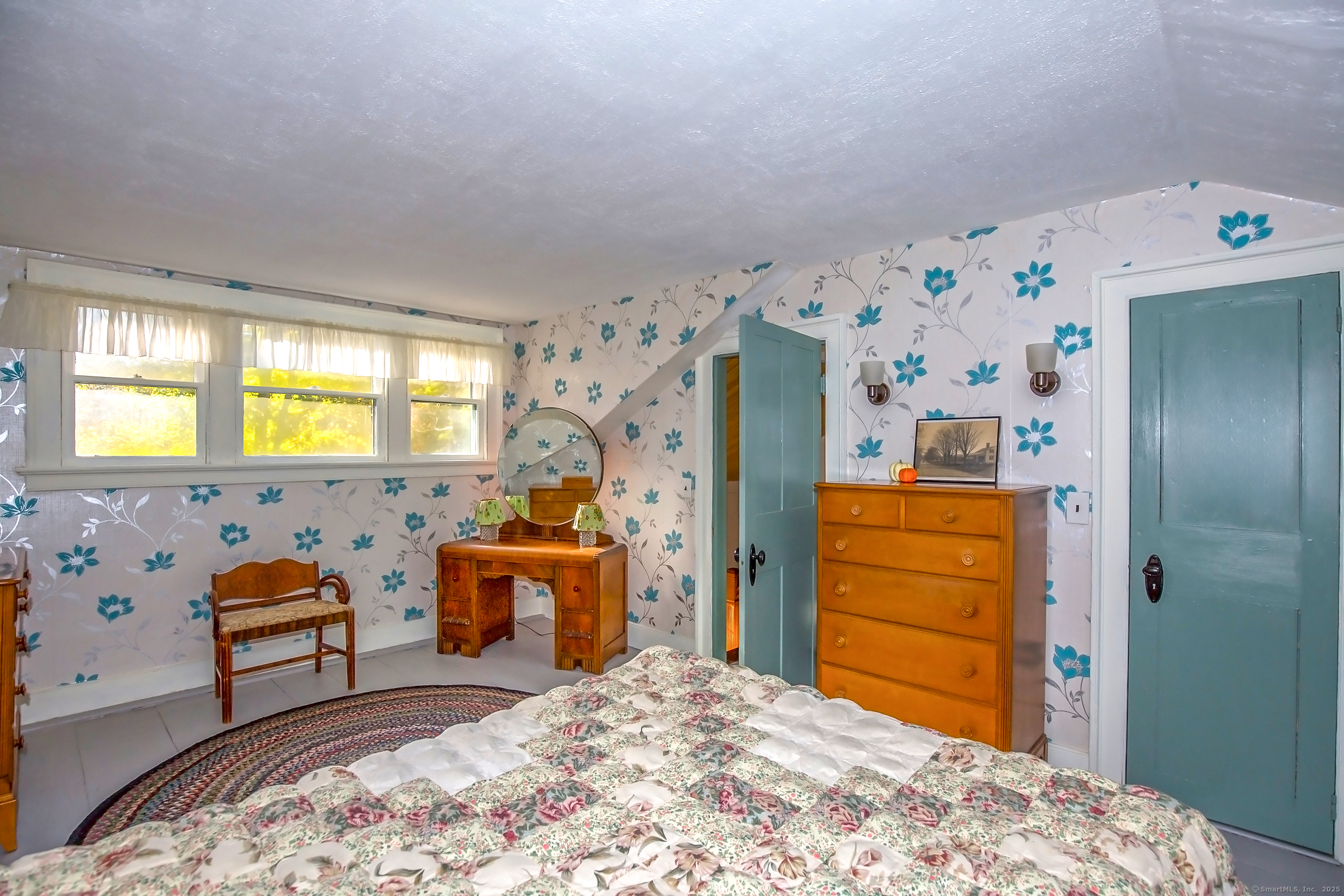 58 Maple Street Ellington, CT 06029 - Photo 41 of 55 a bedroom with a bed and a dresser in it