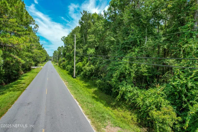 a view of a pathway in front of main door