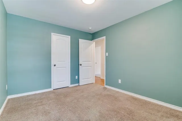 an empty room with an entryway
