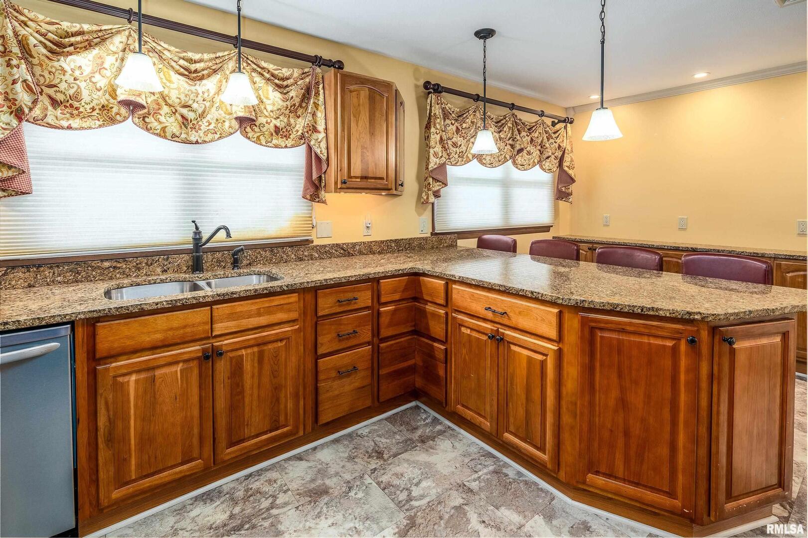 9784 Highway 127 Murphysboro, IL 62966 - Photo 14 of 60 a kitchen with stainless steel appliances granite countertop a sink and cabinets