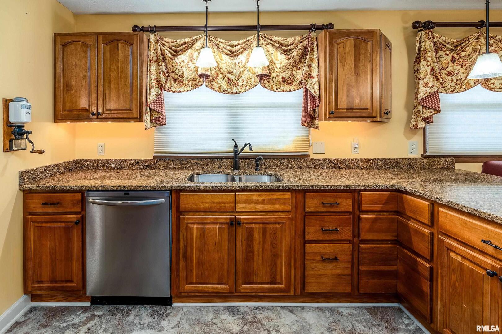 9784 Highway 127 Murphysboro, IL 62966 - Photo 15 of 60 a kitchen with stainless steel appliances granite countertop a sink stove and cabinets