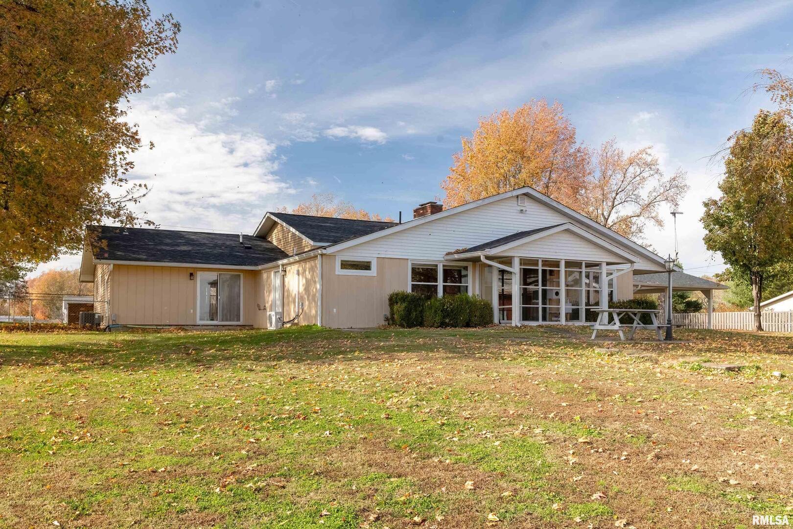 9784 Highway 127 Murphysboro, IL 62966 - Photo 43 of 60 a front view of a house with a yard