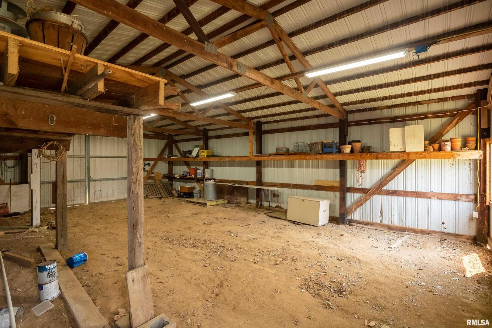 9784 Highway 127 Murphysboro, IL 62966 - Photo 52 of 60 a view of an empty room with storage