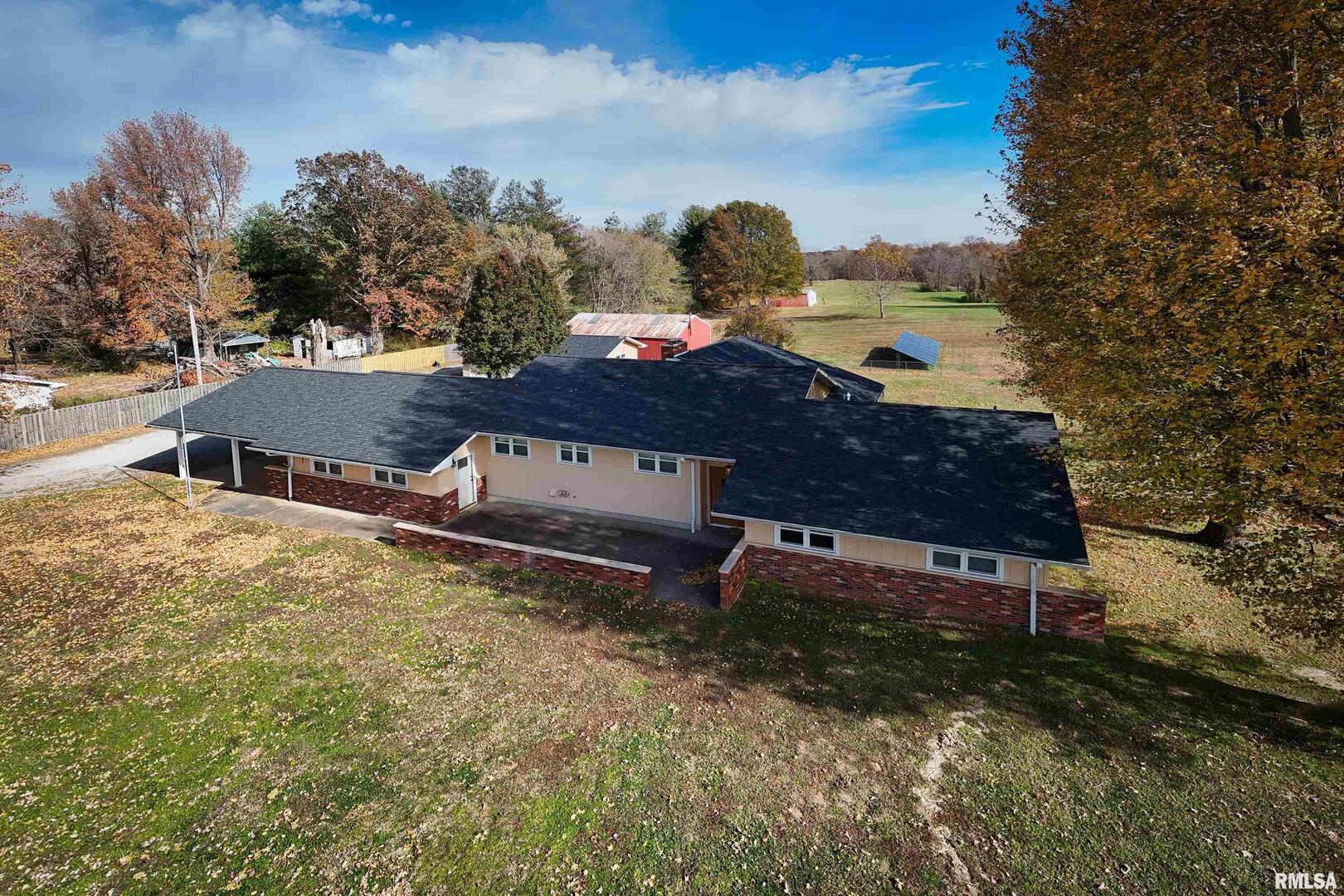 9784 Highway 127 Murphysboro, IL 62966 - Photo 60 of 60 a view of a house with a yard