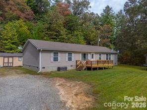 179 Fresh Water Rdg Road Whittier, NC 28789 - Photo 1 of 48 a view of a house with a yard