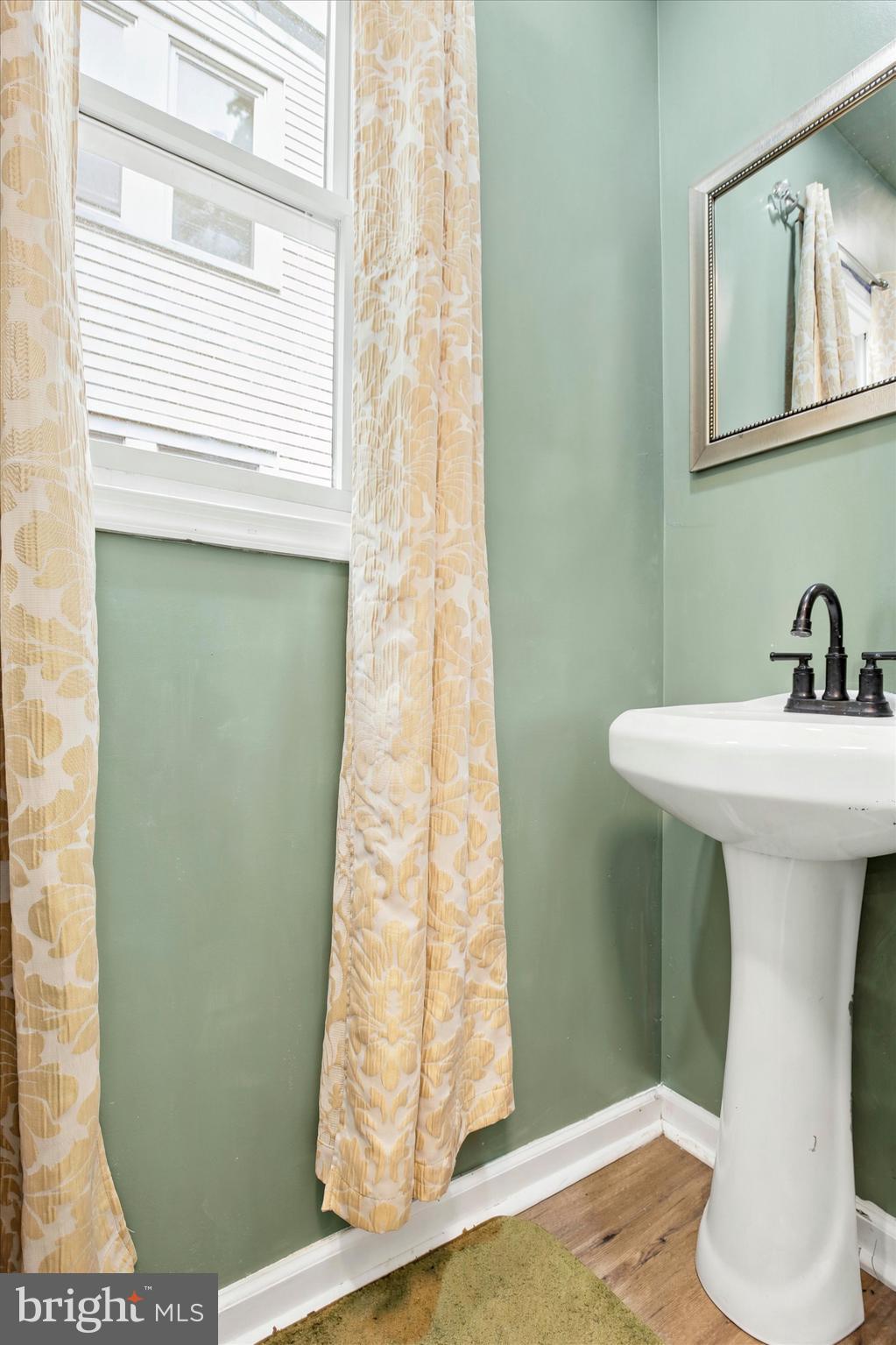 764 Queen Street Pottstown, PA 19464 - Photo 7 of 15 powder room on main floor