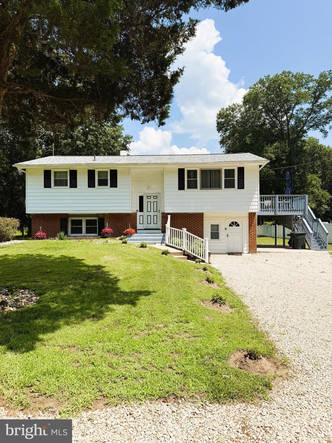 a front view of a house with swimming pool