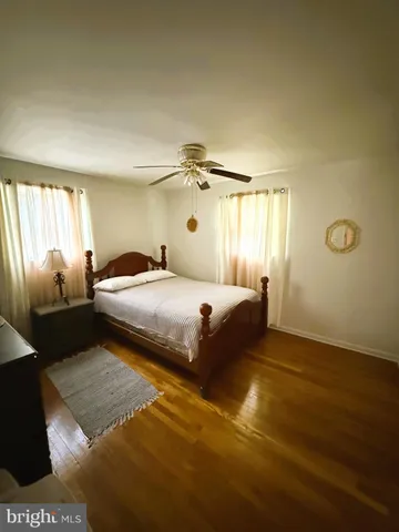 a bedroom with a bed and a walk in closet