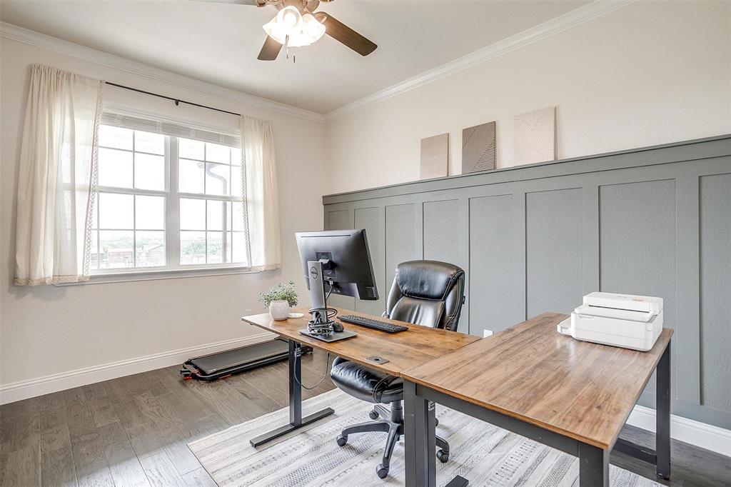 340 Sanger Drive Springtown, TX 76082 - Photo 5 of 38 a view of a workspace with furniture and a window