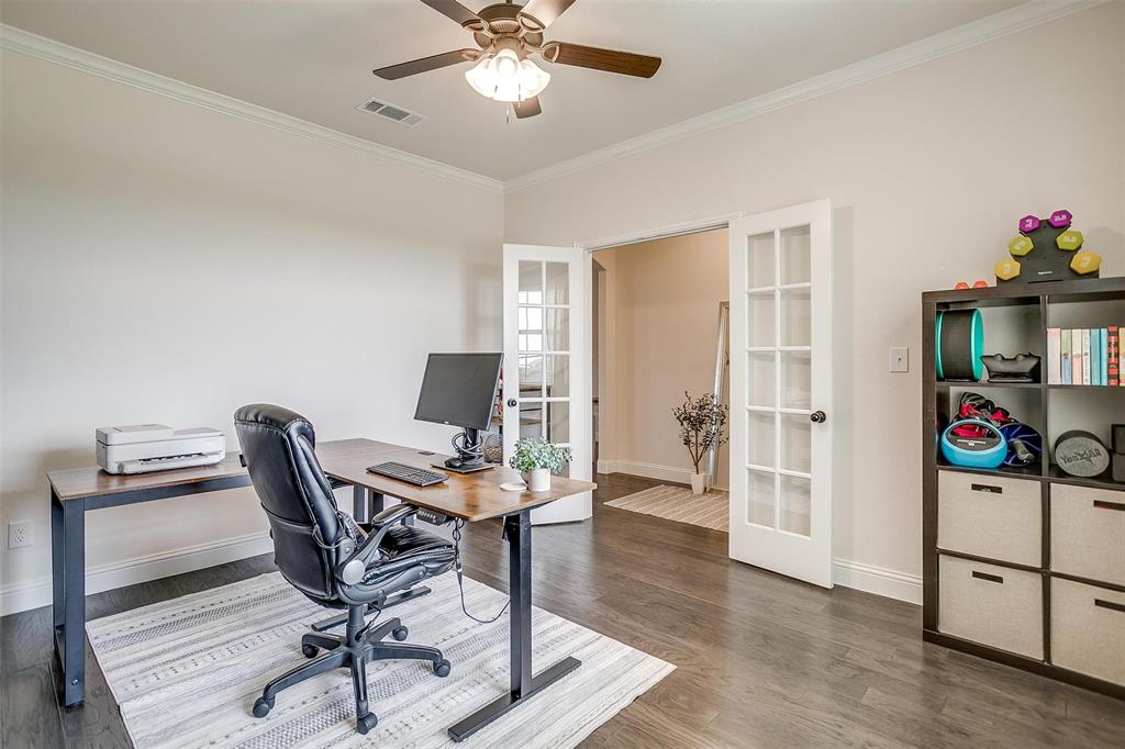 340 Sanger Drive Springtown, TX 76082 - Photo 6 of 38 a workspace with furniture and wooden floor