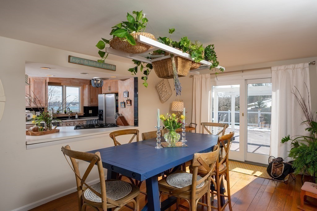 6 Governor Long Road Hingham, MA 02043 - Photo 13 of 24 a outdoor dining space with furniture and wooden floor