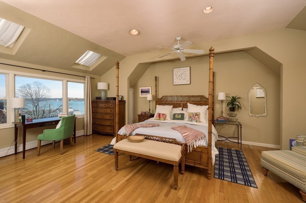 6 Governor Long Road Hingham, MA 02043 - Photo 18 of 24 a bedroom with a bed and wooden floor