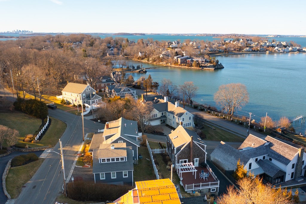 6 Governor Long Road Hingham, MA 02043 - Photo 22 of 24 an aerial view of a house with a lake view