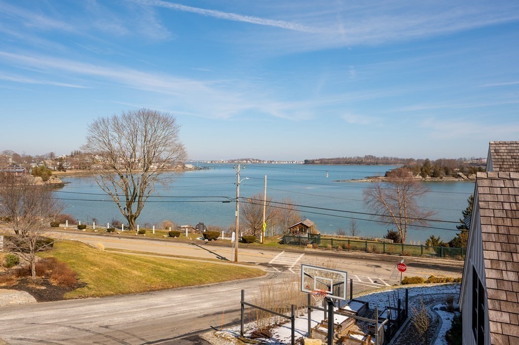 6 Governor Long Road Hingham, MA 02043 - Photo 3 of 24 a view of a lake with outdoor space
