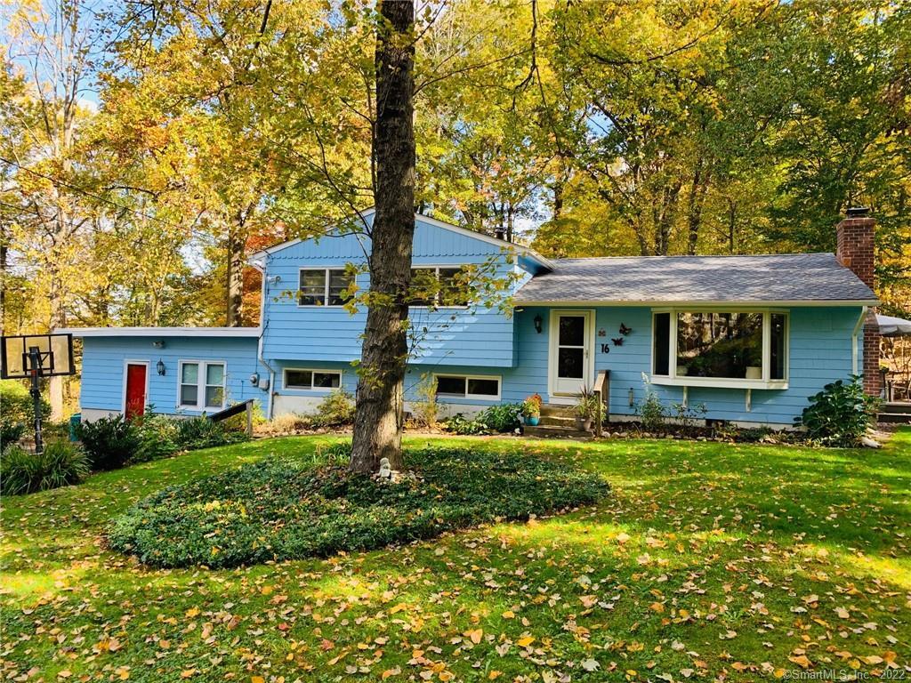 16 Short Lane Ridgefield, CT 06877 - Photo 1 of 1 a front view of a house with garden