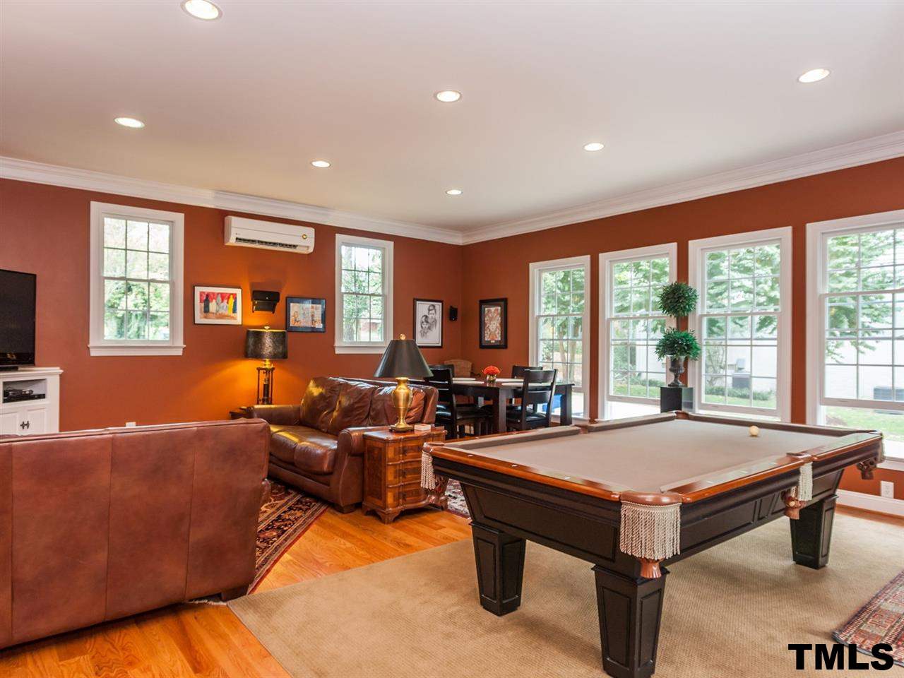 1804 Pony Run Road Raleigh, NC 27615 - Photo 12 of 25 a living room with furniture pool table and a large window