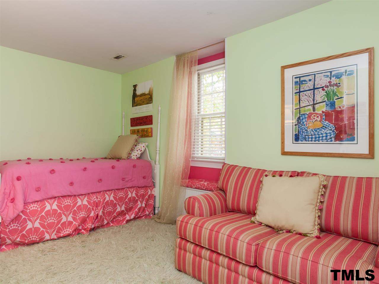 1804 Pony Run Road Raleigh, NC 27615 - Photo 19 of 25 a living room with a couch